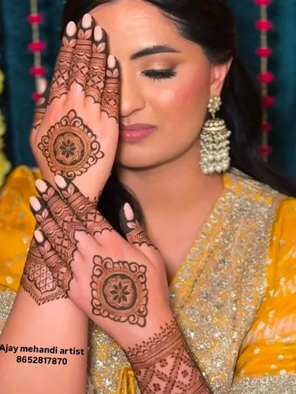 A happy client with a simple and elegant design on the back of her hands, perfect for guests at a wedding or a small function.