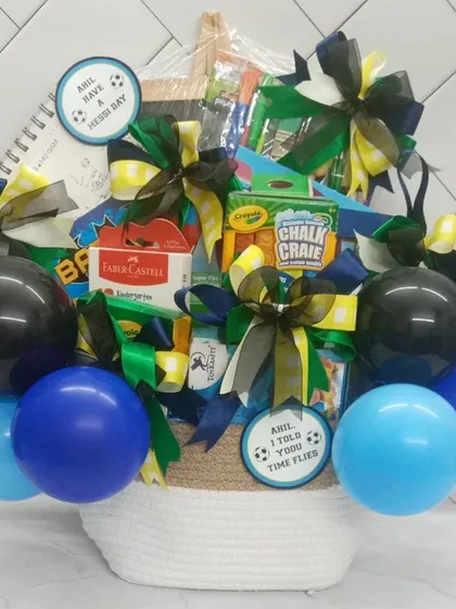 Another art supplies basket, this time in a blue and black theme for a little hero, complete with balloons and a 'Have a Hero Day' tag.