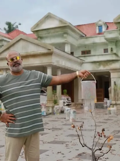 A behind-the-scenes style shot of Suraj Venjaramoodu in character for the Asian Paints TVC.