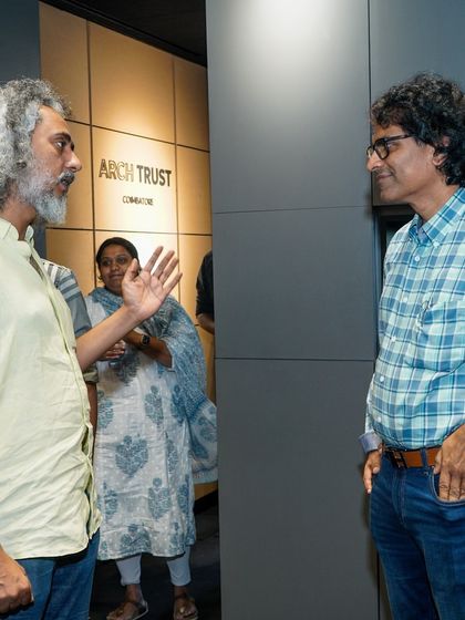 A one-on-one conversation during the networking part of the Open Bench event.