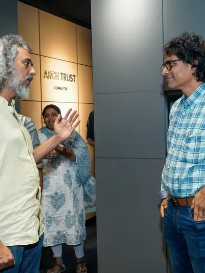 A one-on-one conversation during the networking part of the Open Bench event.