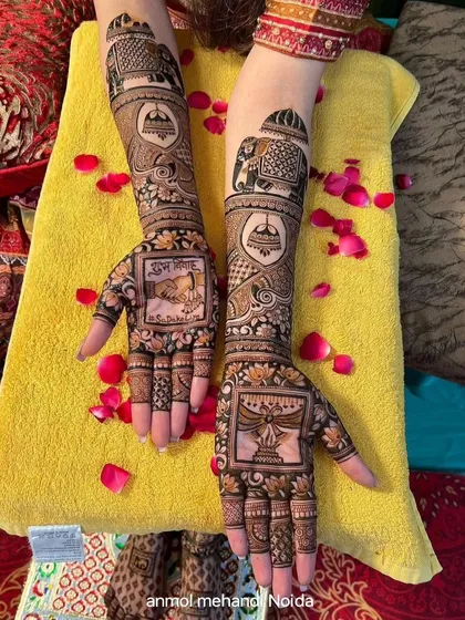 A beautiful bridal design featuring a 'varmala' (garland exchange) ceremony on one palm and a 'diya' (lamp) on the other. The arms are decorated with elephant and palace motifs.