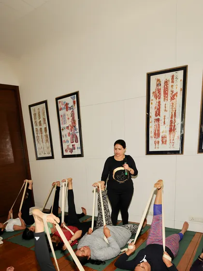 This collection of images captures the essence of my classes. You will see students of all levels using various props, receiving individual adjustments, and practicing together with focus and dedication. Each photo is a glimpse into our journey of alignment and discovery.