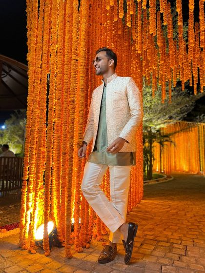 Another angle of my festive outfit. I believe in carrying myself with style and confidence, which translates to my stage presence.