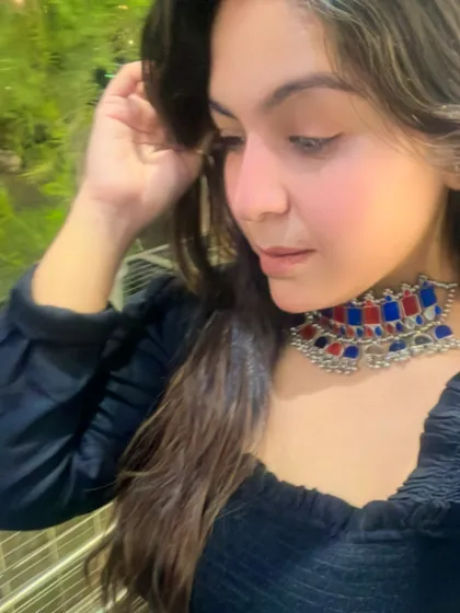 A selfie from my May photo dump. I love how this colorful red and blue choker adds a pop of color to a simple black top.
