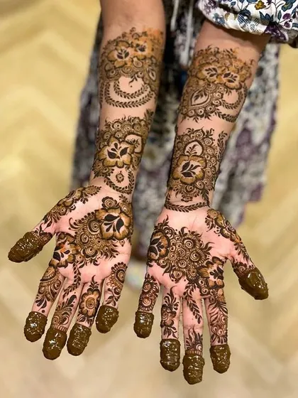 A top-down view of the completed bridesmaid mehndi, ready for the wedding festivities.