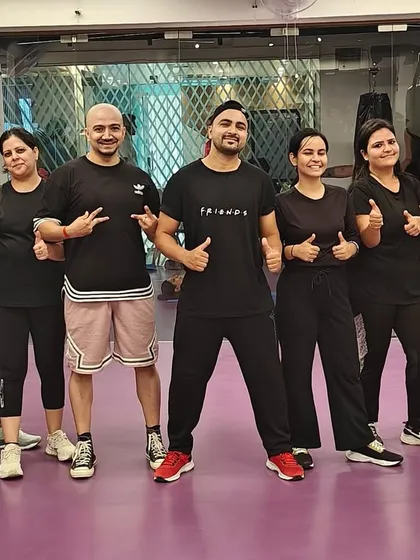 Thumbs up from the entire gang. Another happy moment from our Friendship Day celebration, where we are all twinning in black.