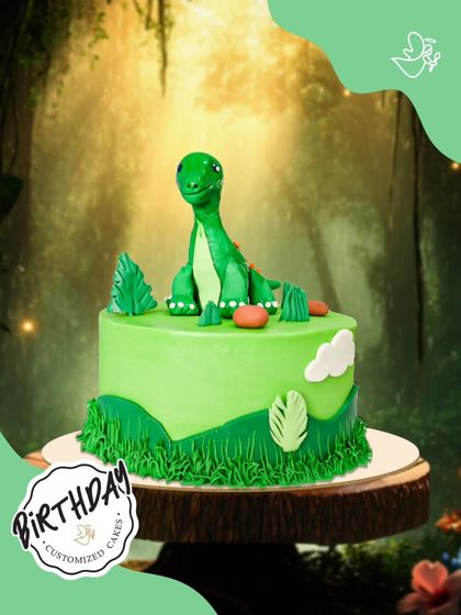 A friendly dinosaur cake for a dino-mite birthday. This cute green dinosaur is perfect for a young fan who loves prehistoric creatures.