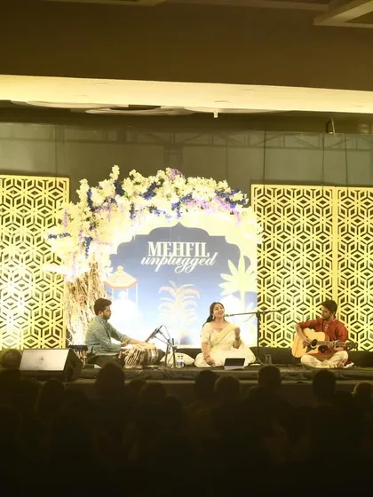 A wide shot of the beautifully decorated stage for 'Mehfil Unplugged' in Ranchi.