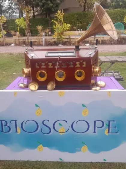 For a touch of nostalgia, I offer a vintage-style bioscope. Guests can peek inside to watch short film clips, providing a unique and memorable old-world experience.
