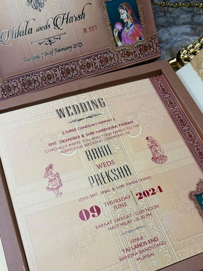 Here you can see how the main insert fits perfectly within the boxed suite. The design elements from the outer box are subtly echoed in the stationery, creating a complete and thoughtfully designed wedding invitation set.