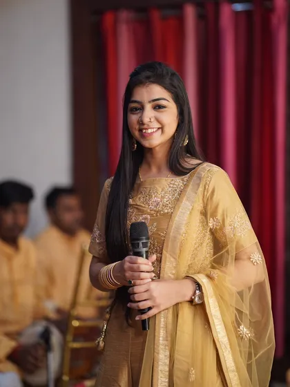 What are you grateful for? A candid moment, holding the mic, ready to begin a performance.