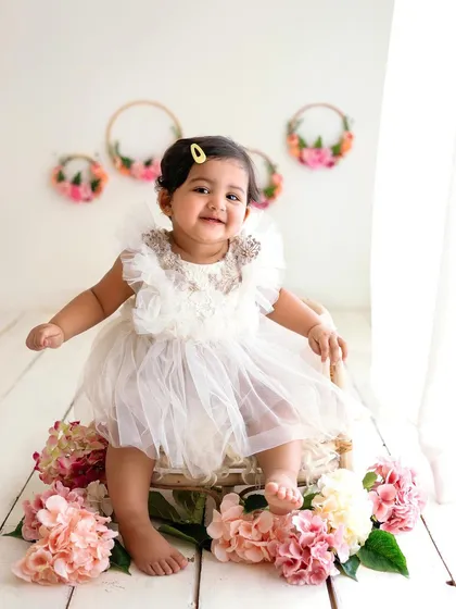 The little wiggle and happy expression make this shot so full of life. Toddler sessions are all about capturing their energy and joy.