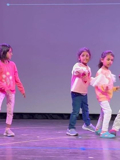 Another angle of our students practicing their dance routine, showcasing their impressive coordination and teamwork.