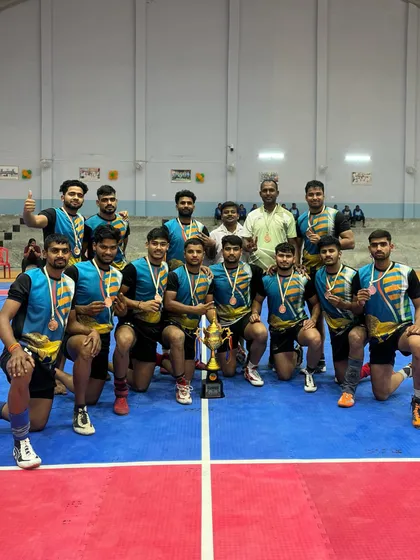 The full team celebrating with the trophy after a strong performance in the East Zone University Games, securing their spot in the All India finals.
