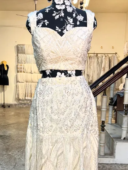 A closer look at our modern lehenga called 'APSARA'. The geometric beadwork pattern is perfect for a cocktail party or reception.