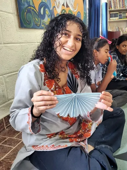Another happy volunteer during our Diwali craft session. These little moments mean so much.