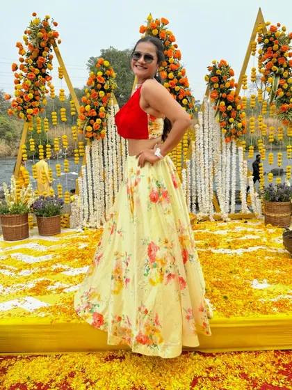 A side profile in my floral lehenga, showing how the outfit moves, perfect for a lively Haldi function.