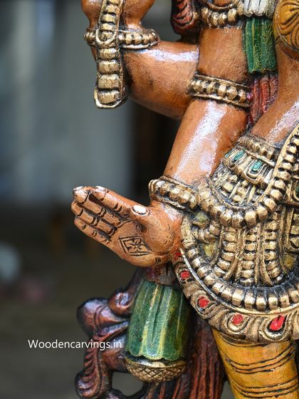 A close-up of the hand of the 47-inch Lakshmi statue, held in the Abhaya mudra (gesture of fearlessness).