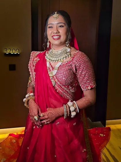 A happy and radiant bride. This close-up shows how the makeup looks natural yet polished, allowing her joyful expression to be the main focus.