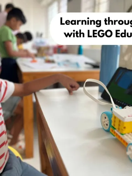 Learning through play is at the heart of what we do. A young student at one of our centers uses a tablet to program his LEGO car, turning a fun activity into a valuable coding lesson.