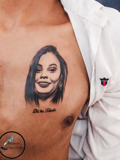 A portrait tattoo of a sister on the chest. We work from photographs to create a realistic and heartfelt tribute to the special bonds of family.