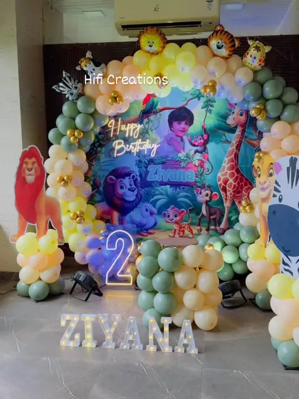 We bring the jungle to you with our popular Jungle Safari theme. This setup for a second birthday features a vibrant backdrop, themed balloon arch, light-up numbers, and life-sized cutouts of favorite jungle animals like lions, zebras, and monkeys.