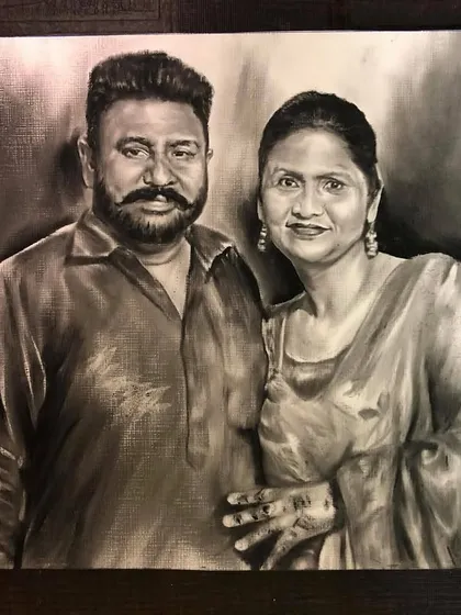 A powerful dry brush couple portrait. The high contrast and detailed shading bring out the strength and character in their expressions.