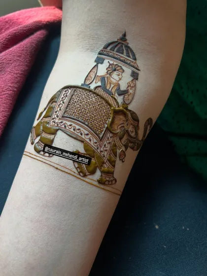 Creating figures is an advanced skill that can make your bridal henna truly special. Here is a detailed royal elephant with a bride in a doli, showing how to use fine lines and filled patterns to tell a story.