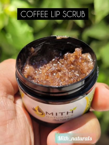 A close-up shot of the Coffee Lip Scrub. You can see the real coffee grounds and sugar crystals that work to heal chapped lips and provide complete hydration.