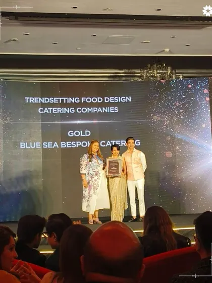 A proud moment on stage, accepting the Gold award for Trendsetting Food Design from WeddingSutra. This is a celebration of our entire team's collaborative spirit and creative vision.