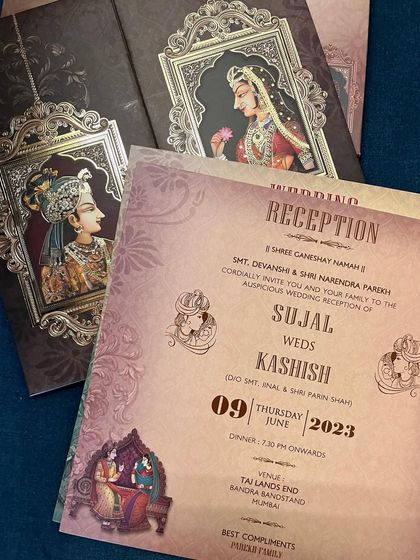 A collection of inserts and covers featuring Mughal-inspired portraits and patterns, perfect for a wedding rich in history and tradition.