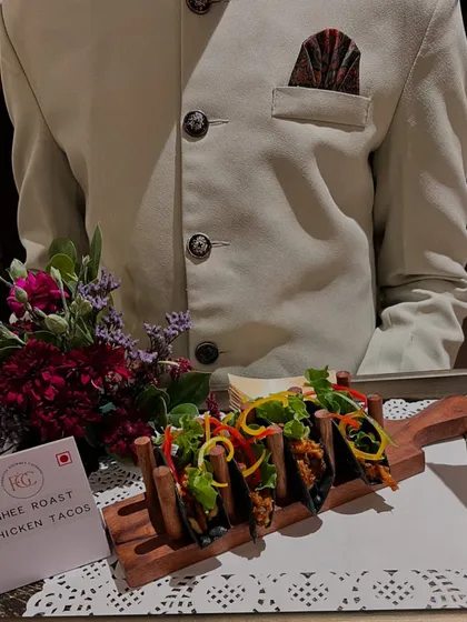 A close-up of our Ghee Roast Chicken Tacos, an example of our innovative approach to passed appetizers. We combine global flavors with artistic presentation to create bite-sized delights that are perfect for networking and social events.