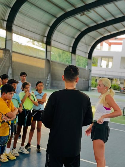 Our students engage with a professional player, learning about the challenges and triumphs of a pro career. These moments are precious and highly motivational for our young athletes.