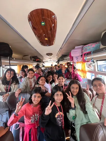 Students enjoy their journey on the bus during the trip to Agra. The travel itself is part of the adventure, filled with fun, friendship, and anticipation.