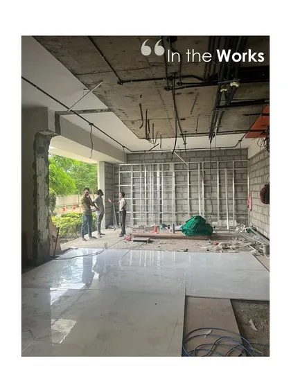 A glimpse of a project in progress. This image from "The Corridors" in Gurugram shows the early stages of construction, where the structural framework for the walls and ceiling is being installed. This raw view reveals the bones of the space before the finishing touches are applied.