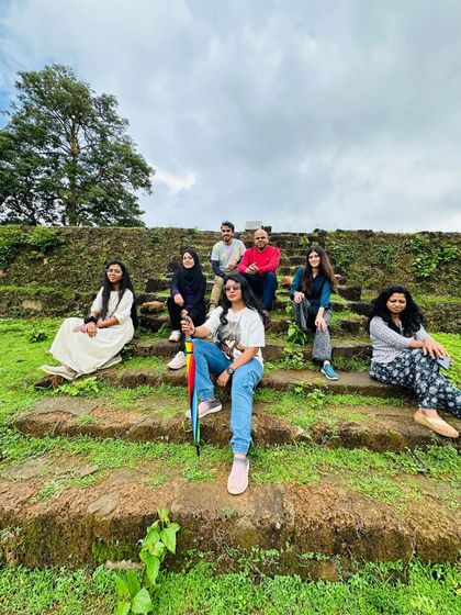 Posing on the ancient steps of Nagara Fort, a historical site we visit during our Kodachadri trip.