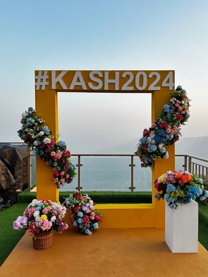 Another angle of the custom hashtag selfie booth, showing how it perfectly frames the scenic mountain view.