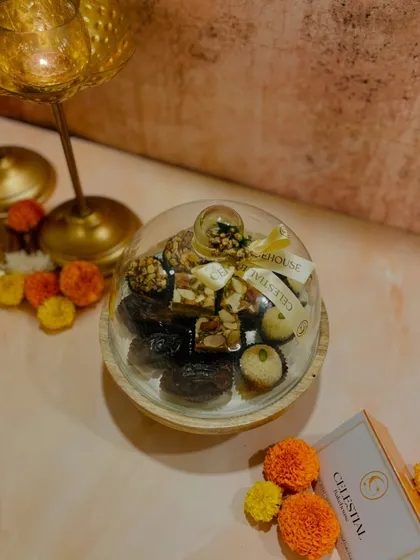The glass cloche keeps the sweets fresh and doubles as a beautiful keepsake for your home.