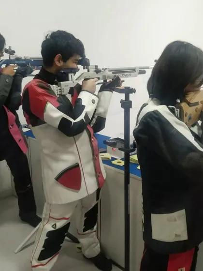 A group of our young rifle shooters training together, fostering a sense of camaraderie and healthy competition.