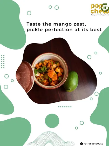 A closer look at the texture and colour of our mango pickle. Each piece of raw mango is perfectly preserved in a symphony of spices, a culinary masterpiece that connects generations.