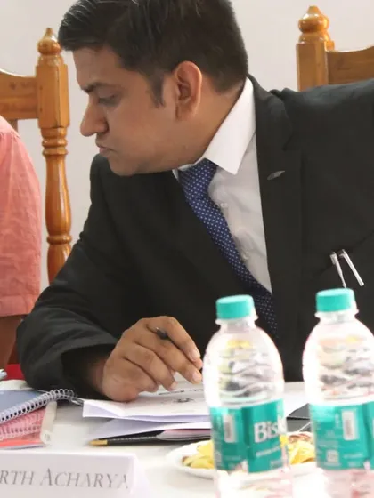 A close-up shot while I was judging the moot court competition, carefully considering the legal arguments and presentation skills of the participants.