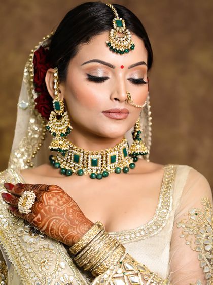 The eyes tell the whole story. This close-up shows the detail of the neutral shimmer eyeshadow and perfectly defined liner that made her bridal look so captivating.