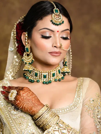 The eyes tell the whole story. This close-up shows the detail of the neutral shimmer eyeshadow and perfectly defined liner that made her bridal look so captivating.