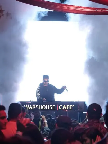 Emerging from a cloud of CO2 smoke at Warehouse Cafe. This dramatic shot makes for a powerful entrance moment.