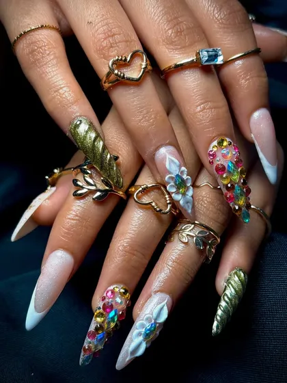 A full view of the ornate and glamorous nail set, a perfect example of advanced nail artistry.