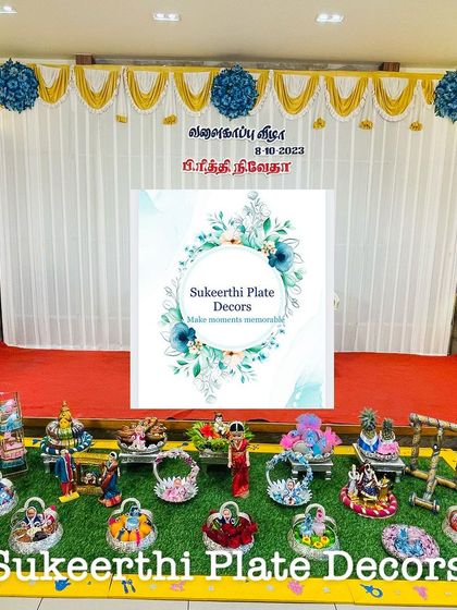 A simple yet elegant baby shower setup at Hotel Abis Grand in Coimbatore. The personalized backdrop and my neat platter arrangement created a lovely setting.
