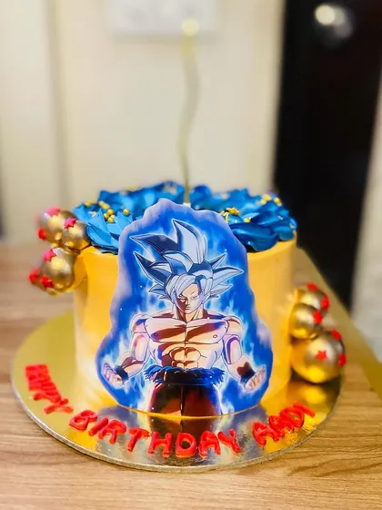 A powerful Dragon Ball Z themed cake featuring Goku, perfect for an anime fan.