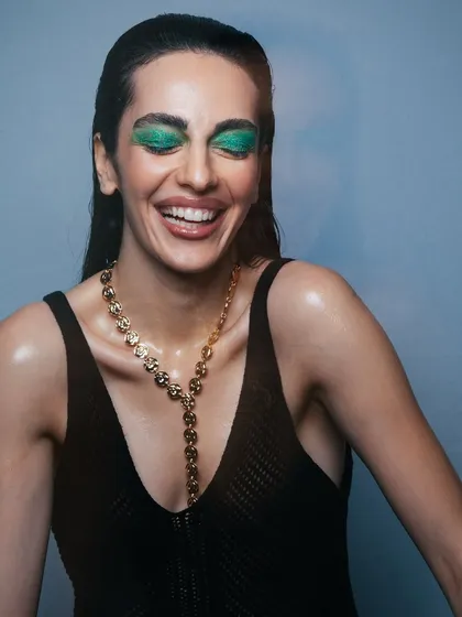 Another happy, laughing shot that shows how well the makeup wears and moves with the model's expressions.