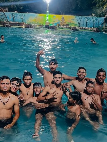 A great group photo of the entire team enjoying their time in the pool. Team bonding is a key part of our academy's culture.